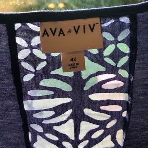 Plain front tunic with sheer design